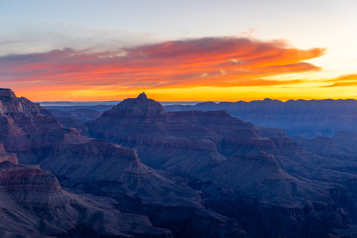 Dawn light over Grand Canyon National Park with layered ridges