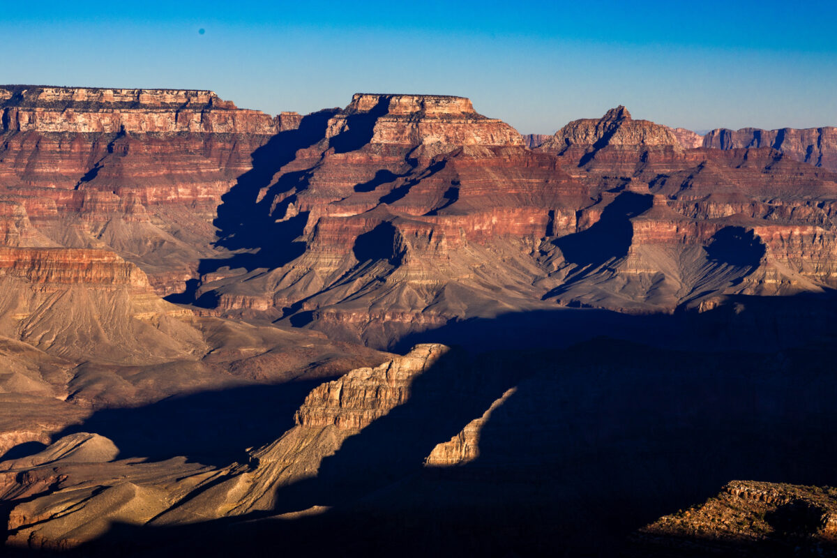 Afternoon shadows across layered cliffs in Grand Canyon National Park