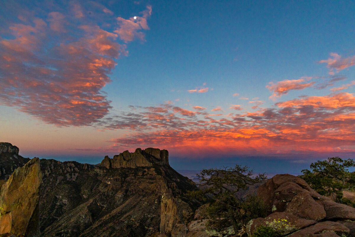 Big Bend sunrise with warm sky over a quiet desert horizon