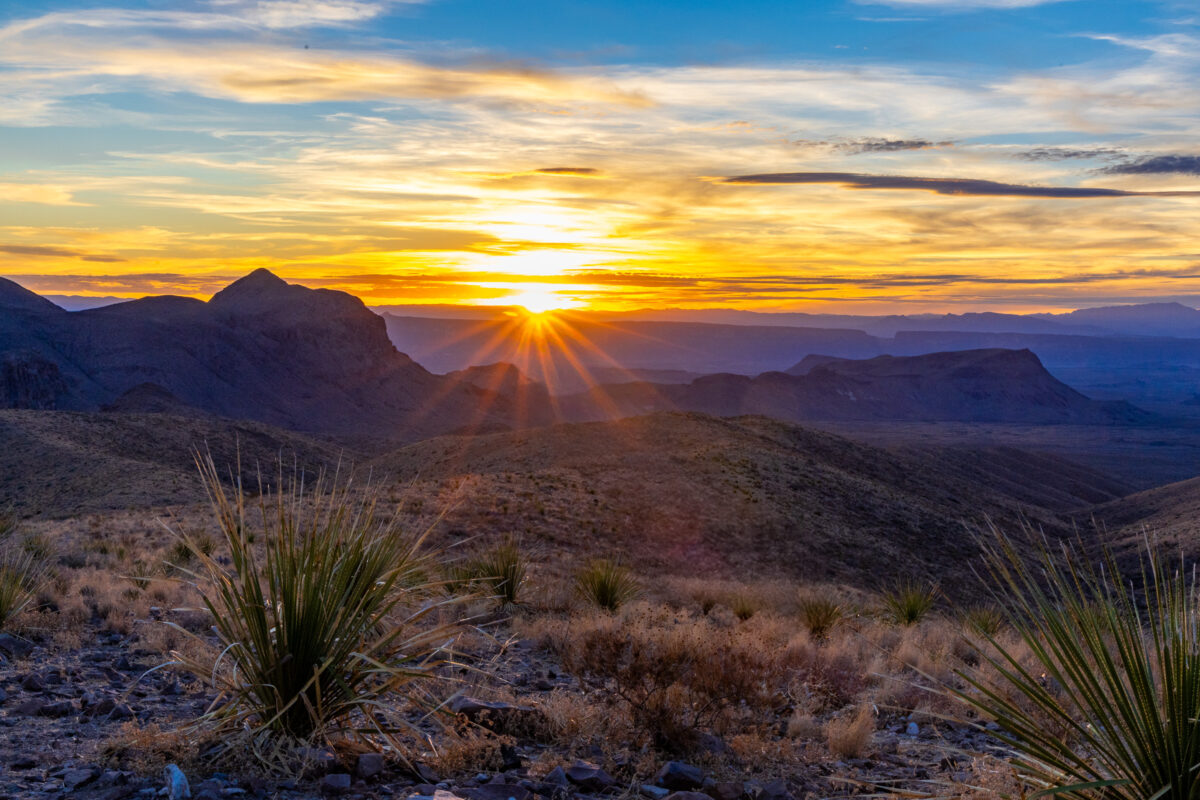 Big Bend sunset with wide desert horizon and glowing clouds