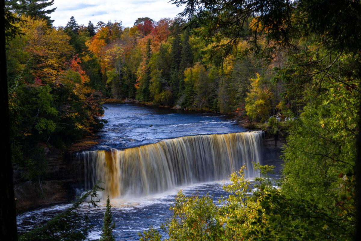 Tahquamenon Upper Falls with amber water and forest, Michigan