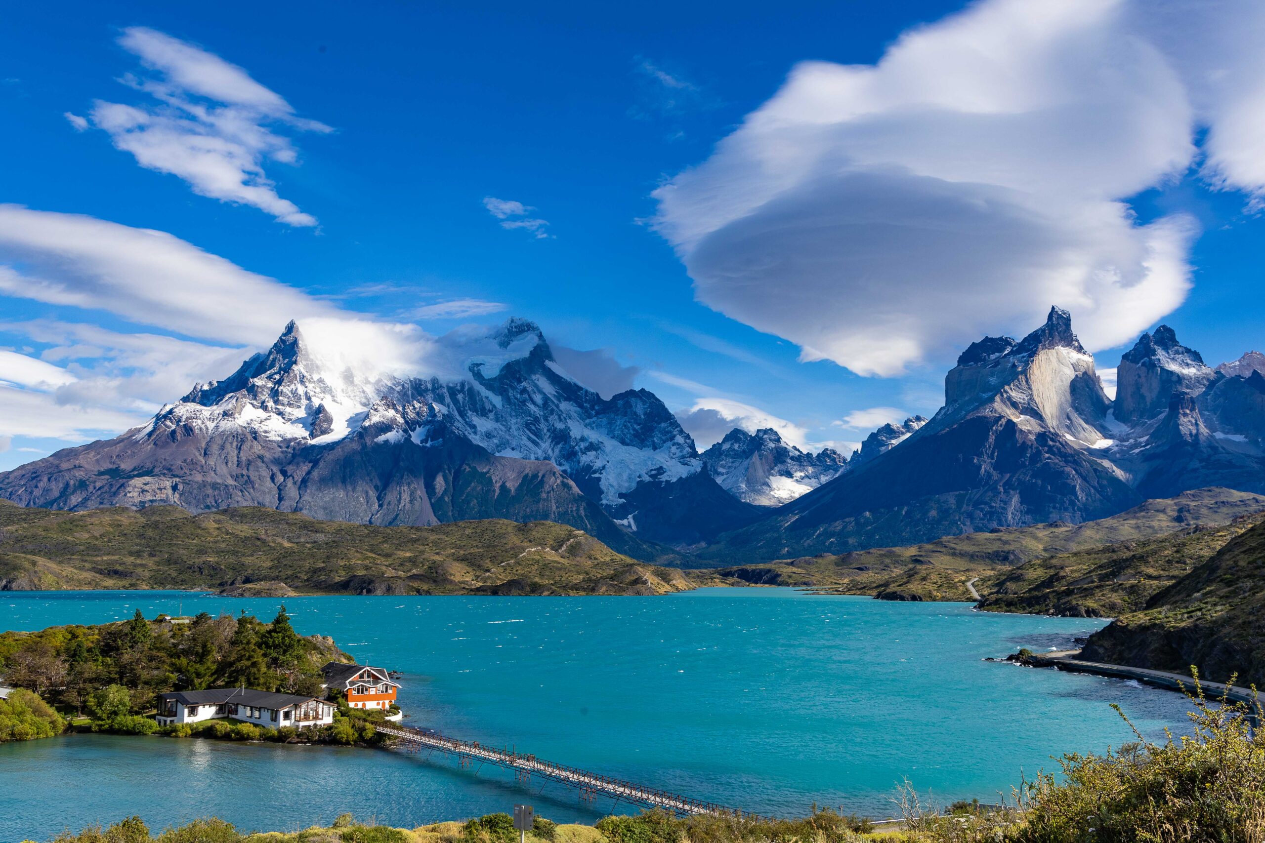 Turquoise Lago Pehoé with Torres del Paine mountains and dramatic clouds in Chile