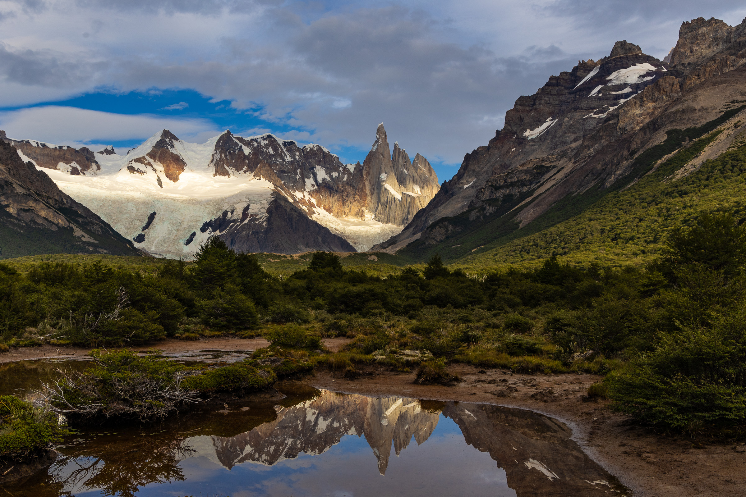 Cerro Torre reflected in calm water in Los Glaciares National Park, Argentina