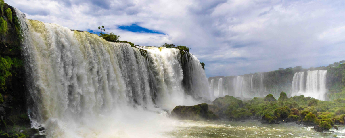 Panoramic ground-level view of Iguazu Falls from the Brazil side