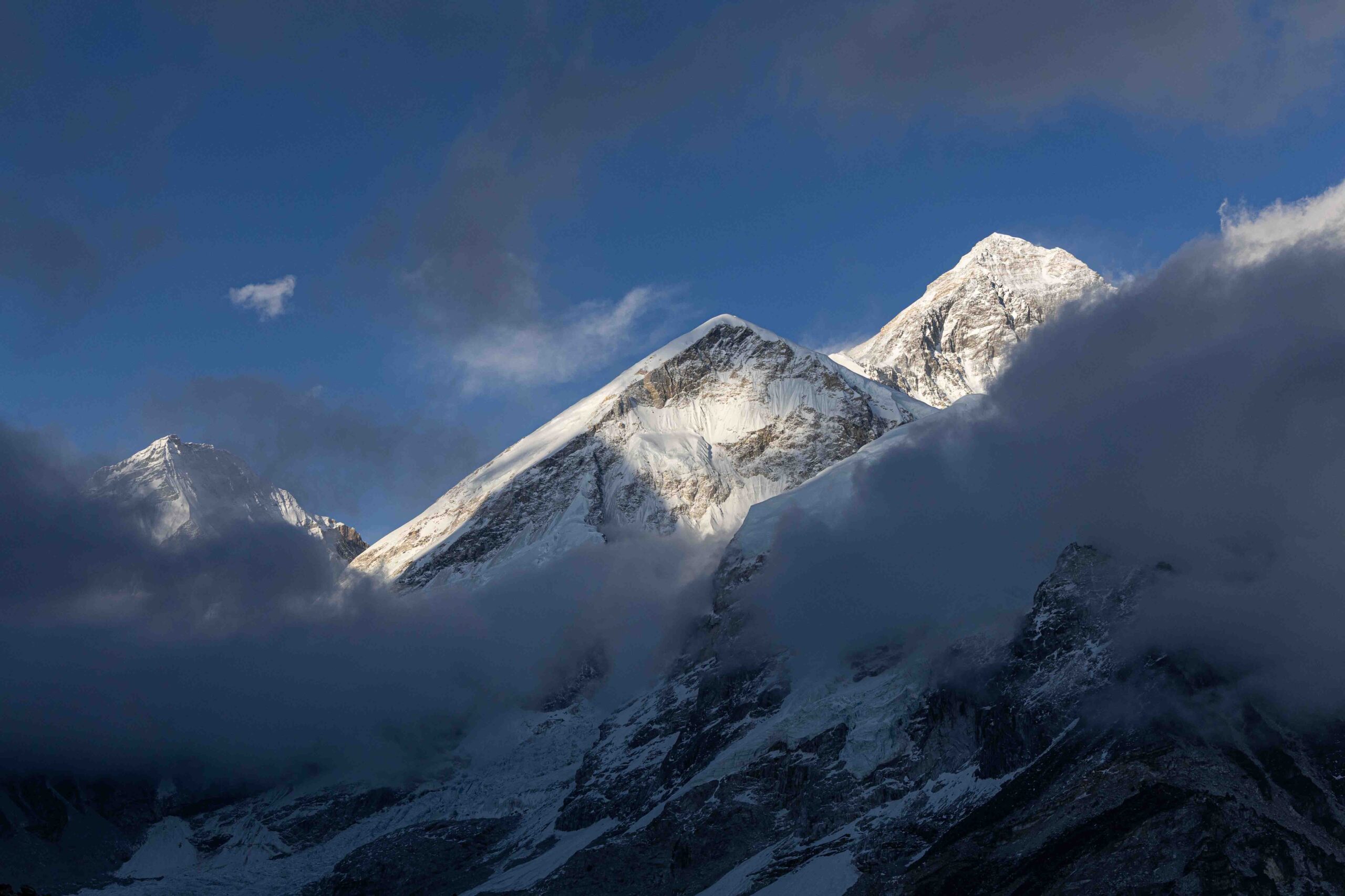 Last rays of sunlight shining on Mount Everest