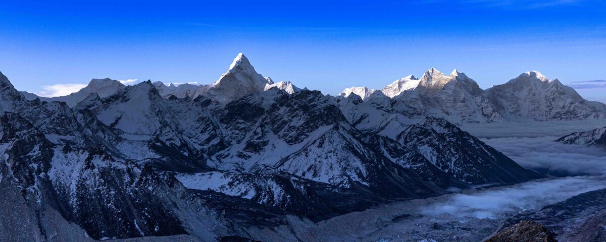 Ama Dablam stands above neighboring peaks in the early dawn light