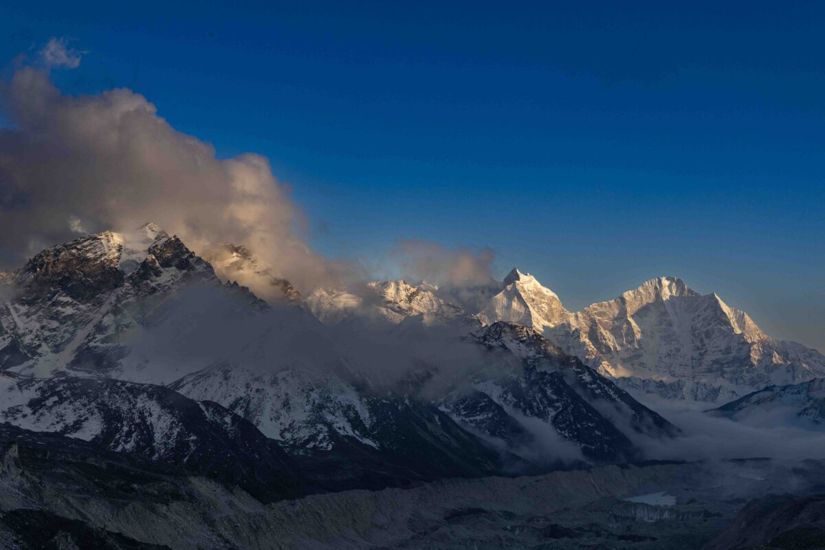 Sunset light across snow-covered Himalayan mountains in Nepal