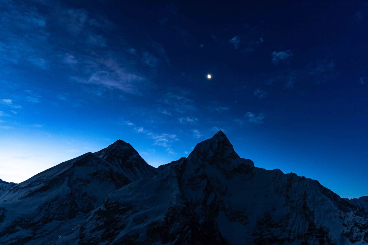 The moon rises over Everest and Nuptse in the Himalaya