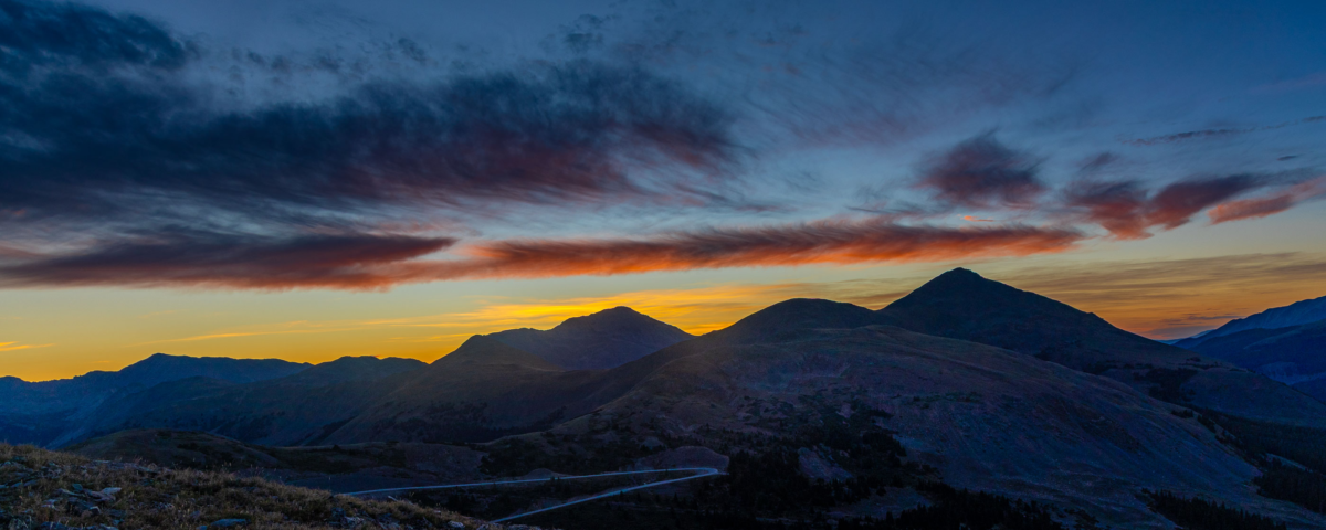 Colorful dawn clouds above the Sawatch Range along Colorado Trail Collegiate West