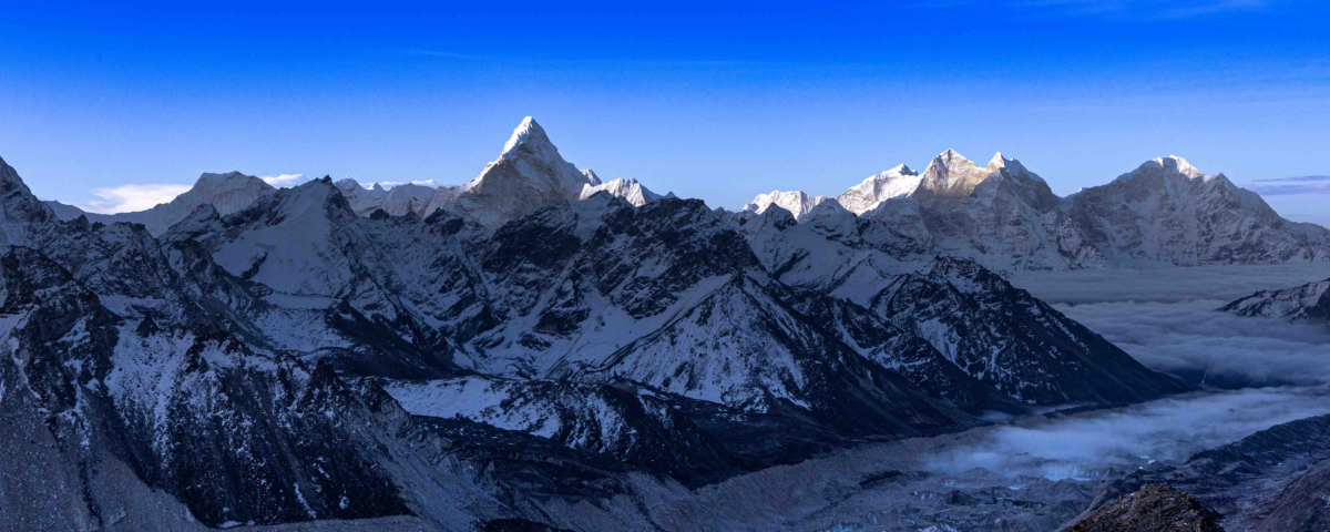 Ama Dablam illuminated at sunrise in a panoramic view of the Nepal Himalayas